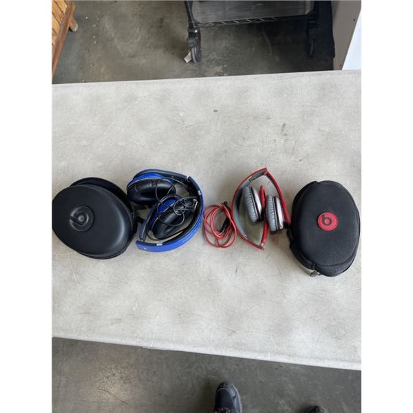 2 BEATS HEADPHONES IN SOFT CASES. WORKING