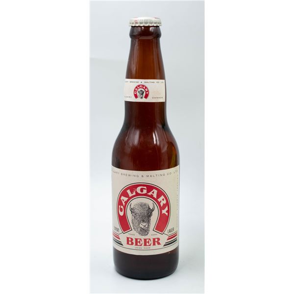 BOTTLE OF VINTAGE CALGARY BEER 5%ALC