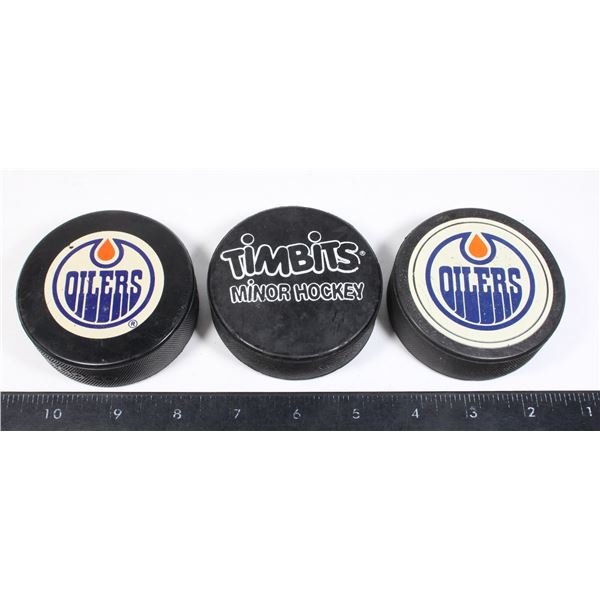 OILERS & TIMBITS HOCKEY PUCKS