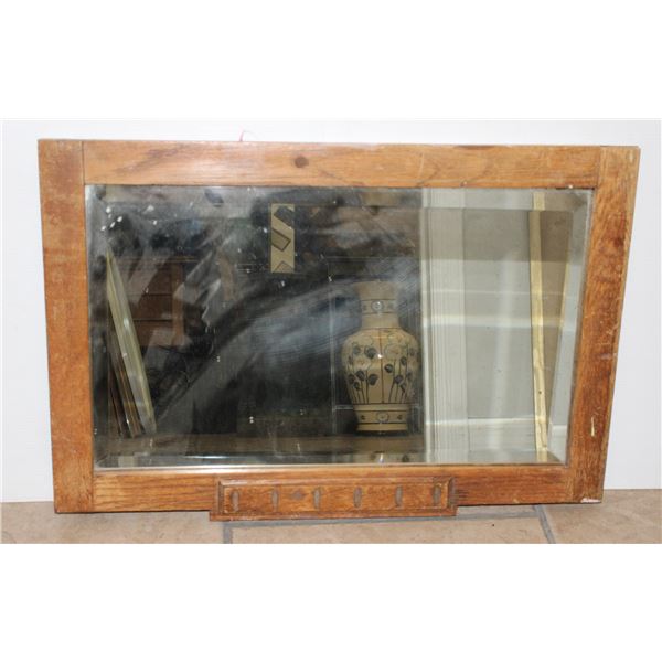 WOOD FRAMED MIRROR. MEASUREMENTS:23"X15"