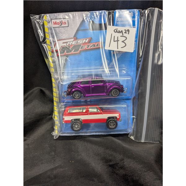 Toy blazer and VW bug