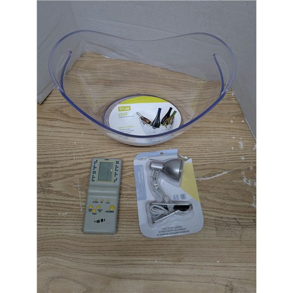 Vintage electronic game, USB clip light, and ice bucket