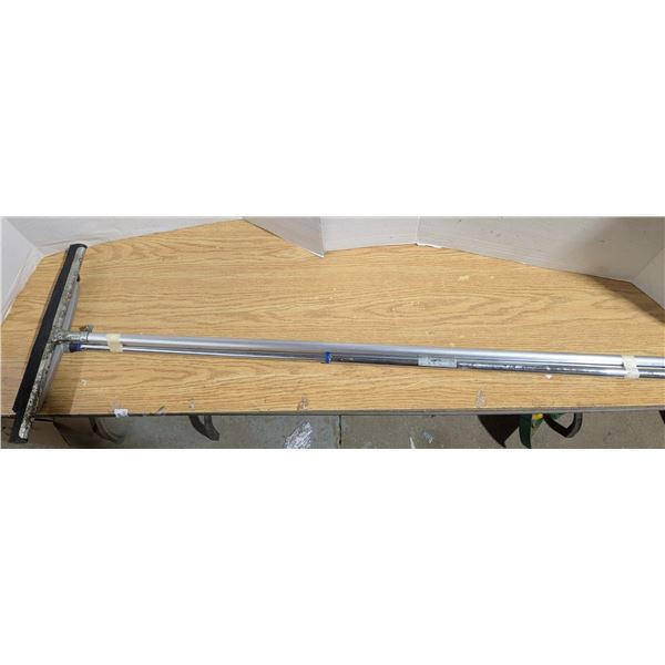 Squeegee and Rubber Bristled Brush