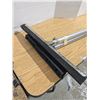 Image 2 : Squeegee and Rubber Bristled Brush
