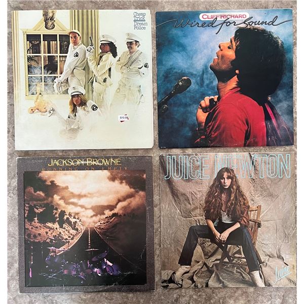 Lot of 4 vinyl records. Cheap Trick, Juice Newton, Cliff Richards, Jackson Browne.