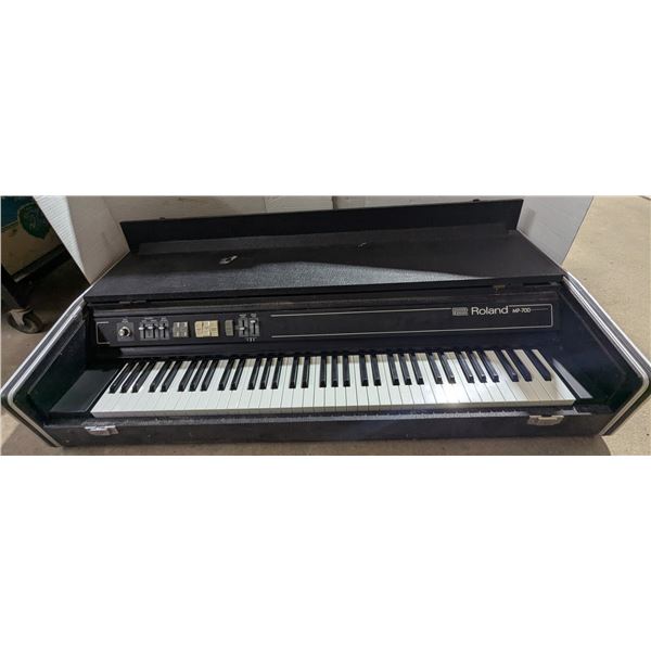 Vintage "Roland" Electronic piano, 49x24x10"