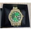 Image 1 : Gold tone watch, green face