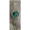 Image 2 : Gold tone watch, green face