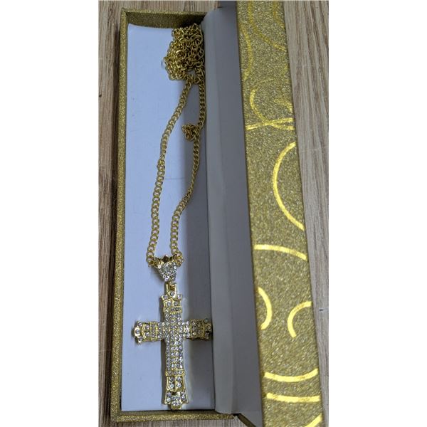 Gold tone cross necklace