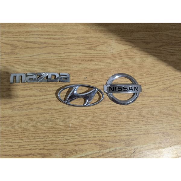 Nissan, Mazda, and Hyundai Emblems