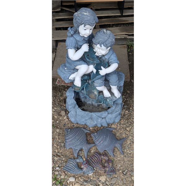 Water fountian with fish décor