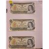 Image 1 : Bank of Canada. Set of 3 1973 $1 notes with Consecutive Serial Numbers. Crow-Bouey signatures. AMZ P