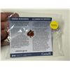 Image 1 : Canada Remembers Pin. Gold Maple Leaf and Red Poppies. Housed in its unopened original plastic packa