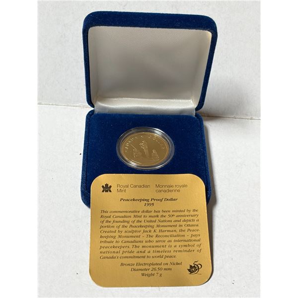 1995 Peacekeeping Loonie Dollar. Proof with Ultra Heavy Cameo. Housed in its original RCM case and b