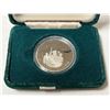 Image 2 : 1984 Cartier Nickel Dollar. Proof with Ultra Heavy Cameo. Housed in its original RCM case and box.