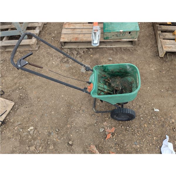 Grass seed/fertilizer spreader