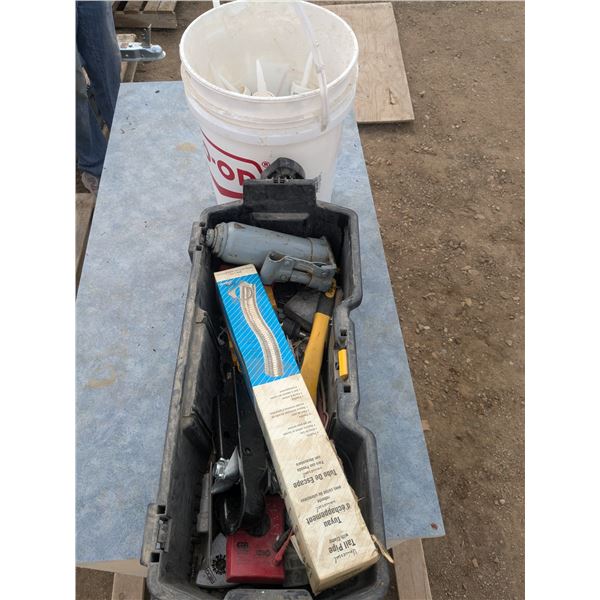 Toolbox of misc with bucket of sealant