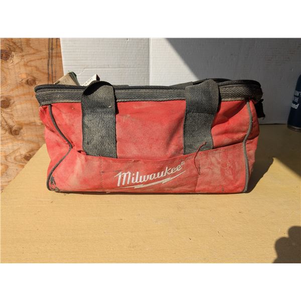Milwaukee toolbag full of staples, nails, etc