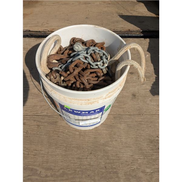 Bucket of tow rope and chains