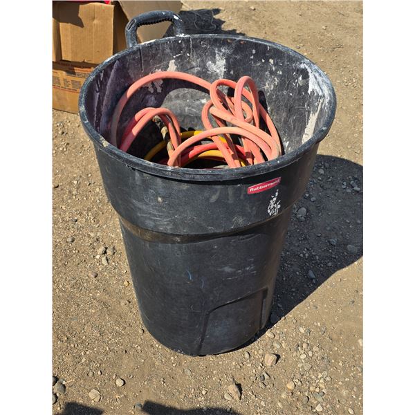 Garbage can full of air hoses