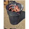 Image 1 : Garbage can full of air hoses