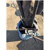 Image 1 : Garbage can full of misc items- piping, saw guild