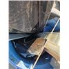 Image 2 : Garbage can full of misc items- piping, saw guild