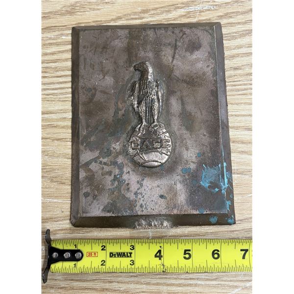 Vintage brass plaque or emblem featuring the J.I. Case company's "Old Abe" eagle perched on a globe.
