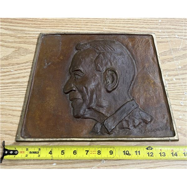 Vintage Bronze relief plaque depicting a profile portrait that resembles former U.S. President Woodr