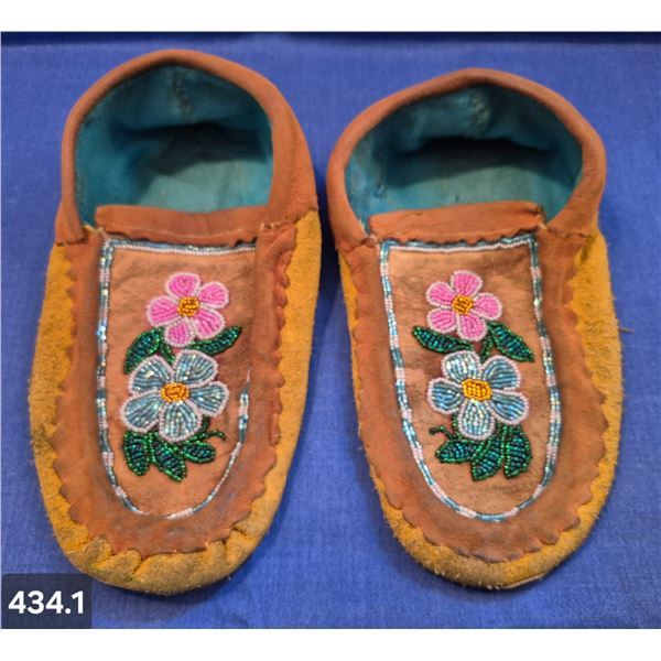 Pair of vintage hand-stitched moose hide mocassins (except for pad on sole), early facetted beadwork