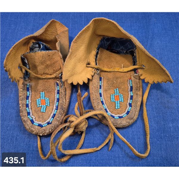 Pair of baby-size hand-stitched moose hide beaded mocassins, good condition