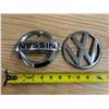 Image 1 : Nissan  and Volkswagen  Emblems.