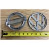 Image 2 : Nissan  and Volkswagen  Emblems.