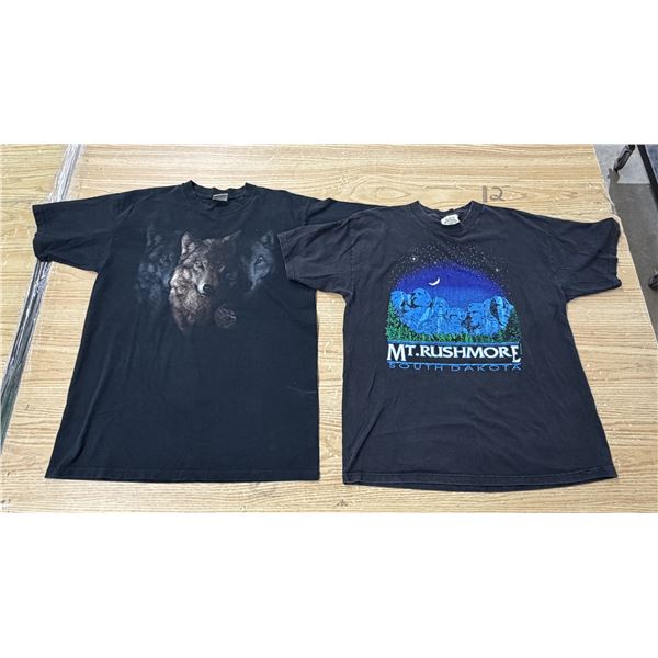 (2) XL T-Shirts Black graphic t-shirt featuring a "Wolf Trilogy" design with three wolf heads  and b