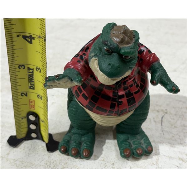 Vintage Earl Sinclair action figure from the popular 1990s live-action television series Dinosaurs, 