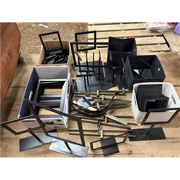 Black metal tabletop sign holders and display frames, including flat weighted bases, vertical posts,