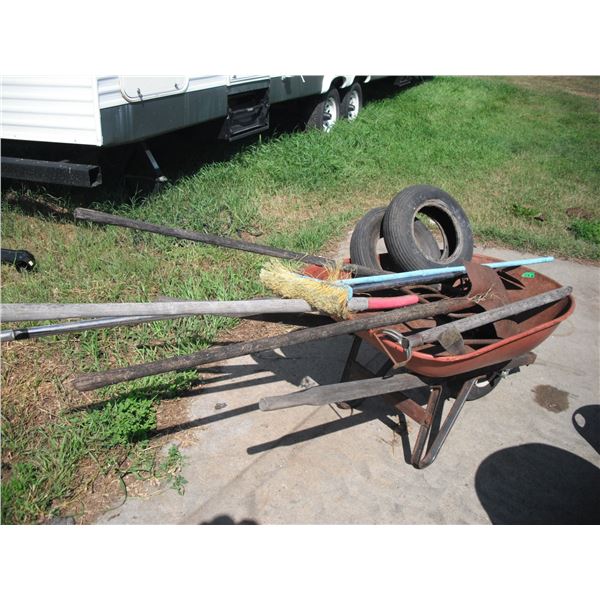 wheel barrow (as-is) with assorted had tools, etc.