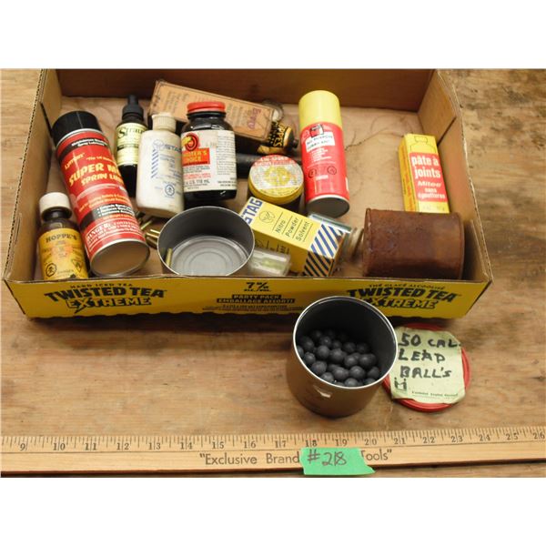 assorted gun related parts and cleaners
