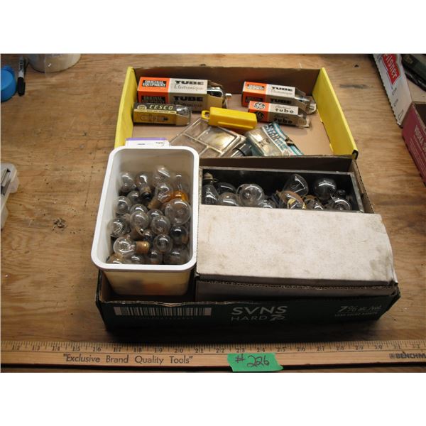 vintage automotive bulbs, tire repair tools, etc.