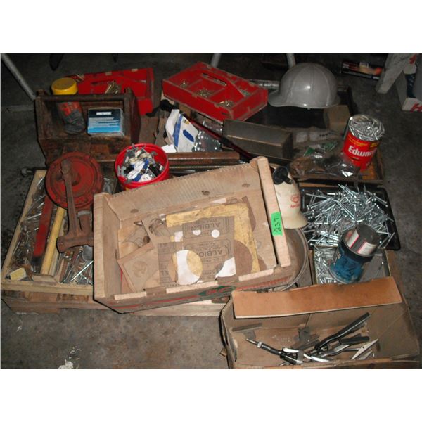 pallet of lag bolts, saw blades, electrical, pump piece, etc.