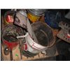 Image 1 : pallet of oil barrels (BA, Shell, Co-op), hub caps, engione parts, etc.