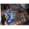 Image 4 : pallet of oilers, spark plugs, tool bag, steel rings, etc.
