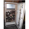 Image 1 : huge lot of welding rods in vintage McClary fridge