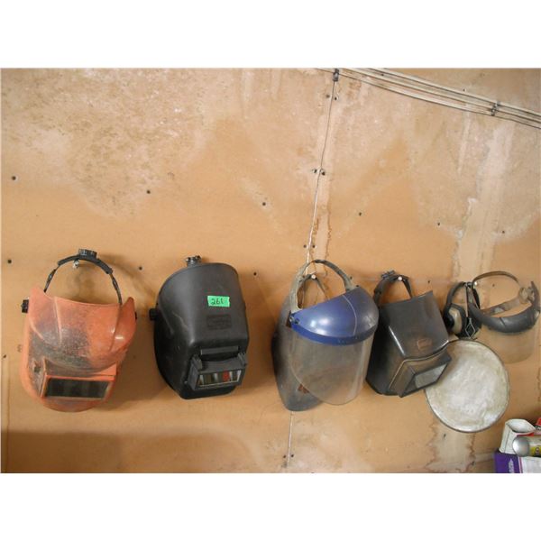 lot of welding masks and face shields