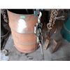 Image 4 : barrel made into work rac with cable winch, chains, etc.
