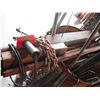Image 5 : barrel made into work rac with cable winch, chains, etc.