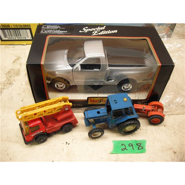 Maisto 1:26 diecast F150 in box, ERTL tractor, Tonka firetruck & 3180 tractor