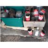 Image 1 : crate and tote with oil tins, bottles, etc.