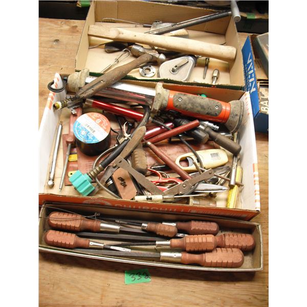 lot of tools - screwdrivers, light, measuring tape, etc.