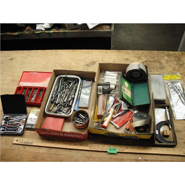 sharpening stone, drill bits, etc.